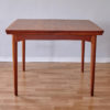 Front view of Arne Vodder Cado dining table 592
