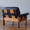Back of Brazilian armchair in wood and black leather