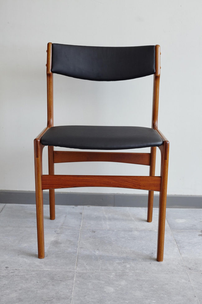 Front of Danish black skai dining chair at an angle