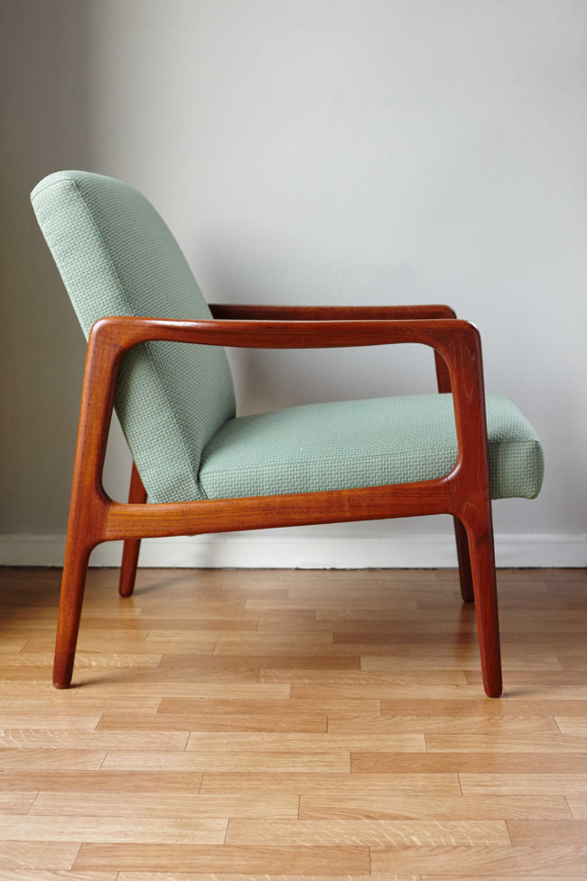 Profile of Danish mid-century green armchair