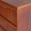 Corner of Danish teak chest of drawers