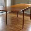 Danish teak dining table with extensions open