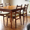 Extendable Danish teak dining table with 4 chairs