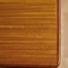 Wood grain close up of extendable Danish teak dining table