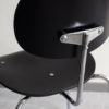 Close up of back and seat of a Egon Eiermann Wilde Spieth SE68 chair at an angle