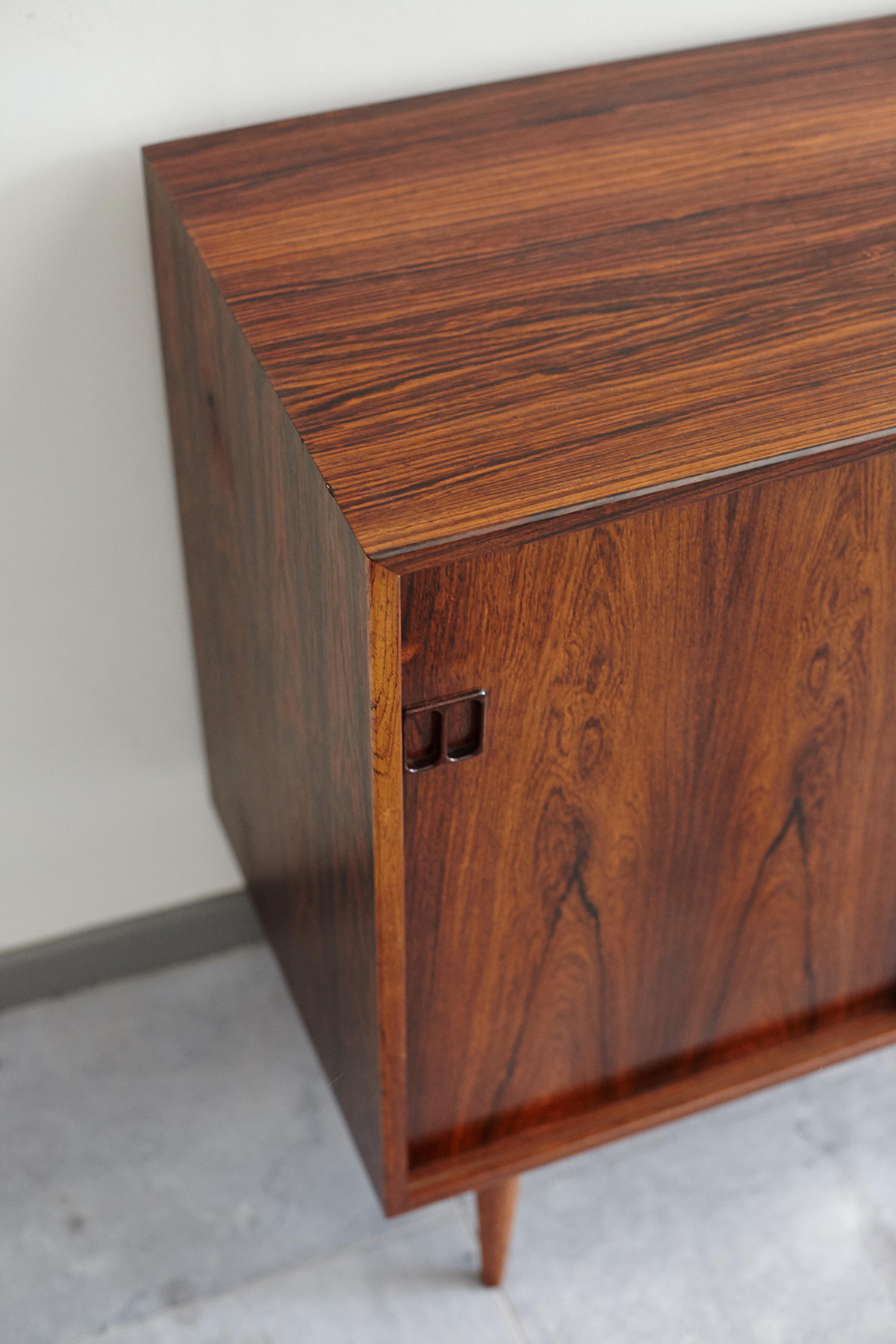 Left door from above of Hjornebo Mobelfabrik rosewood cabinet