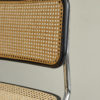 Close up of backrest and frame of Italian wicker chair