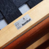 Komfort stamp under the frame of the chair