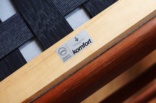 Komfort stamp under the frame of the chair