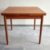 Compact teak dining table