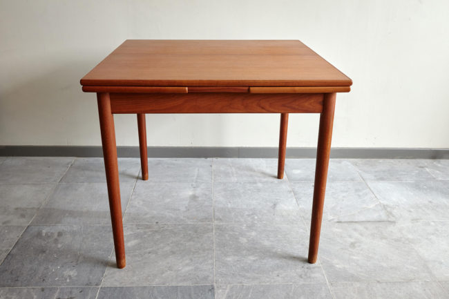Compact teak dining table