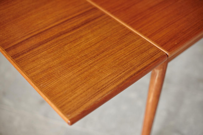 Left extension of Compact teak dining table