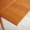 Right extension of Compact teak dining table