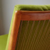 Close up of back of Soloform green Boomerang chair
