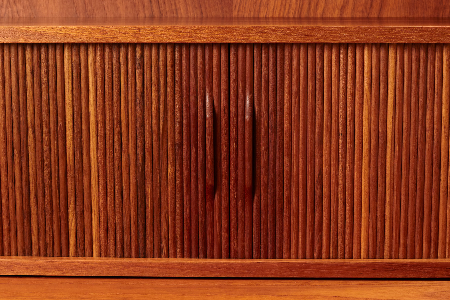 detailed view from the front of the tambour doors showing the slight uv fading