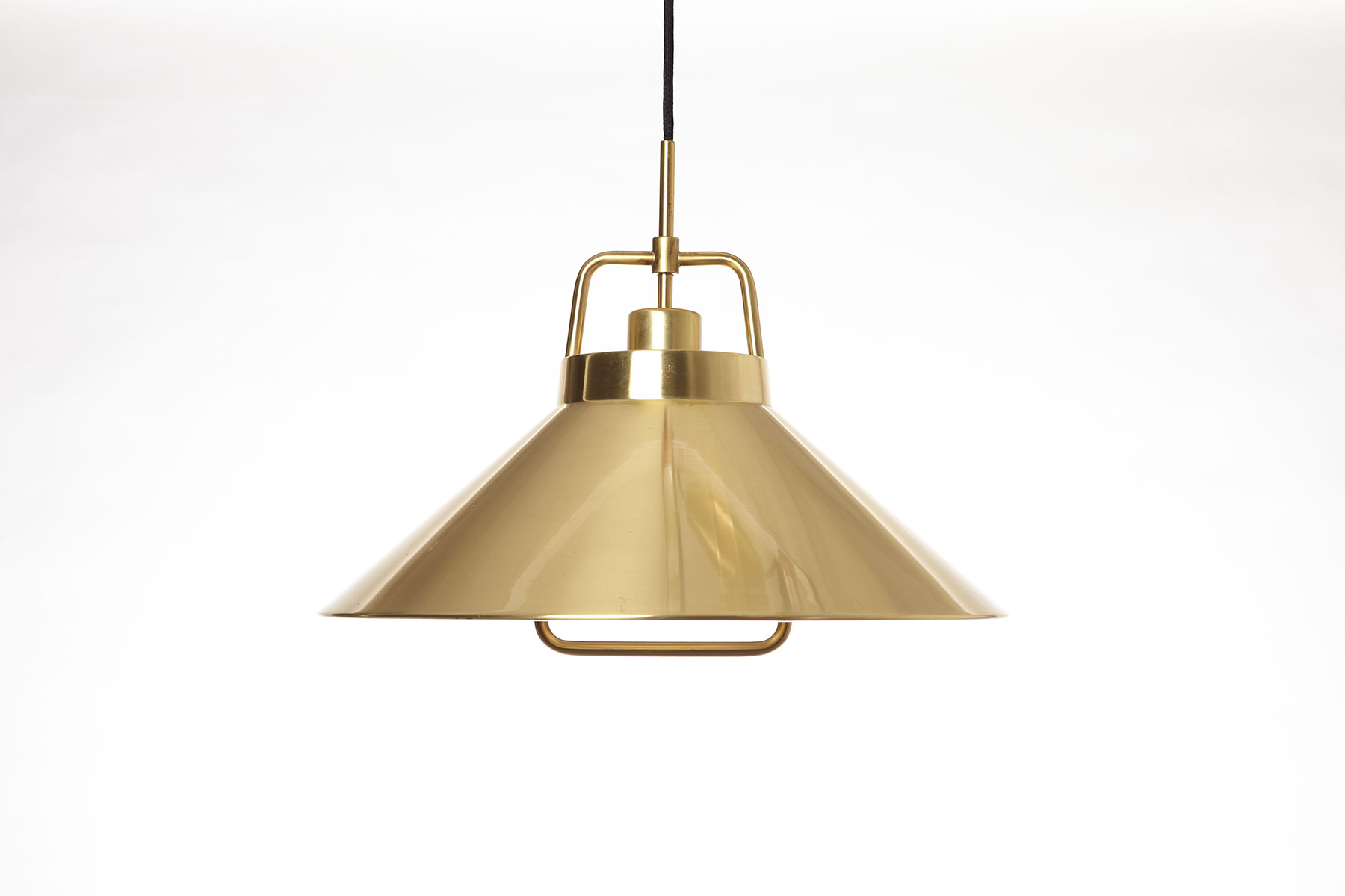 Brass pendant light designed by Fog & Mørup, shown on a white background