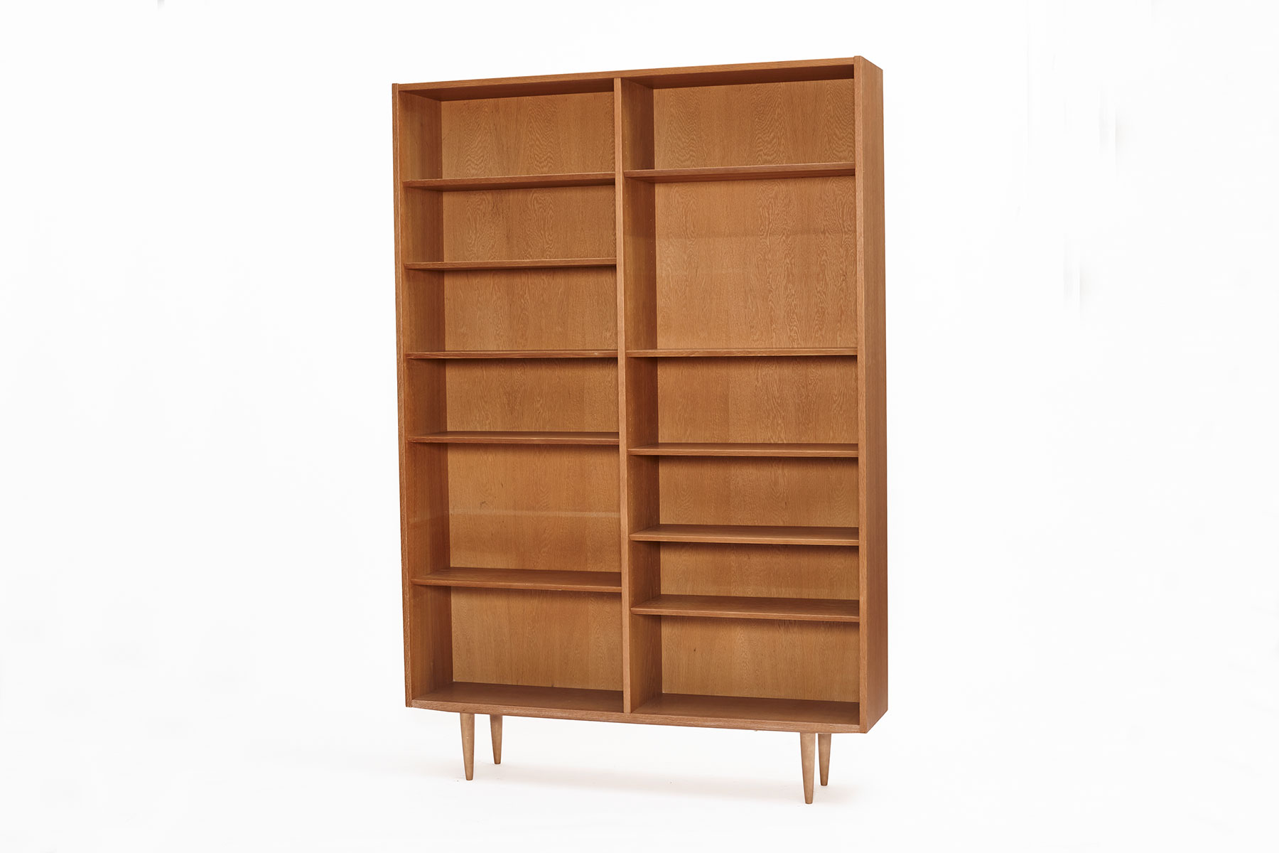 Oak Bookcase designed by Poul Hundevad, Denmark 1960s. Pictured on a white background